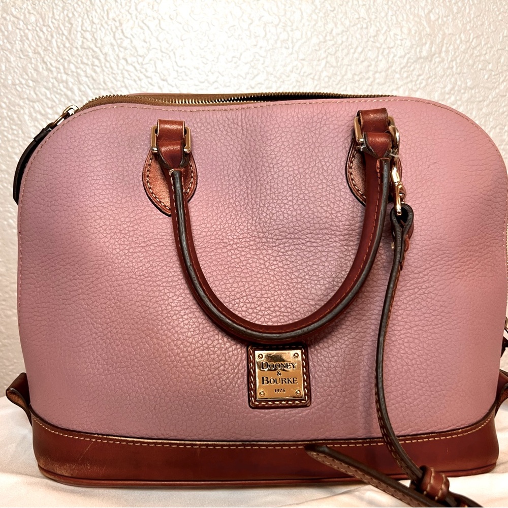 Dooney and Burke zip zip satchel color mauve.